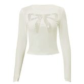 Top de encaje transparente con lazo Coquette